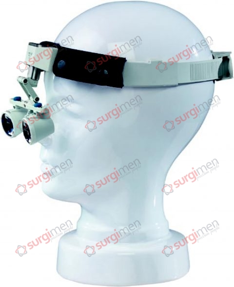 Binocular head magnifier, consisting of headband of black celluloid and magnifying glass, magnifying 1.8x, free working distance 40 cm approx., vision field ø 10 cm, working distance and size of field adjustable.